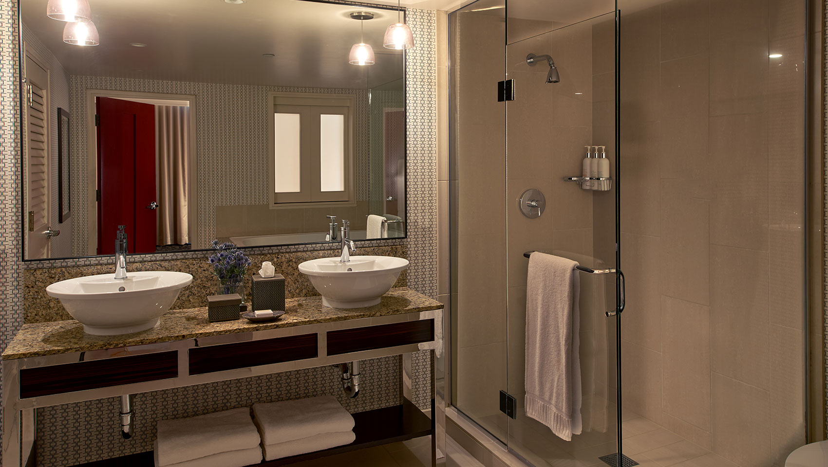 Spa suite bathroom with walk-in shower and double sinks at Kimpton Hotel Palomar Beverly Hills